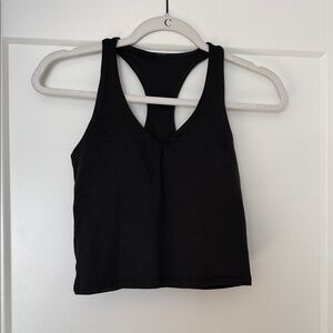 Vuori racer back tank with a built in bra. Super comfortable!